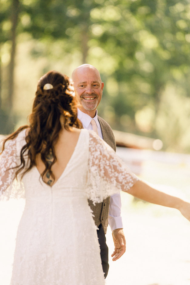 The bride's first look moment with her father outside at Glen Brook Farm.