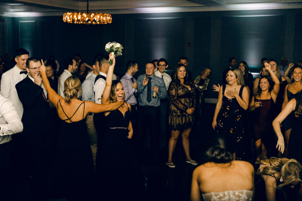 Guests dancing at a Queensbury Hotel wedding reception in Upstate New York.