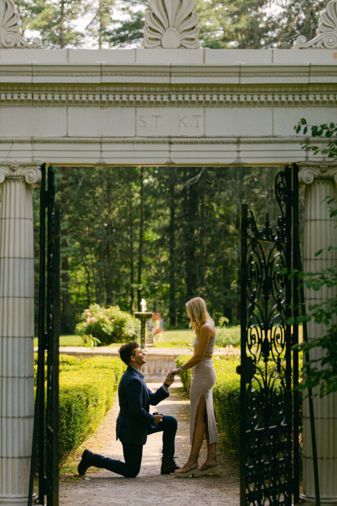 Peter proposing to Blythe in July 2022 at The Gardens at Yaddo in Saratoga Springs, New York.